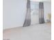 Bedroom featuring neutral carpet, light walls, and bright window at 4145 Lunar Canyon Ave, North Las Vegas, NV 89084