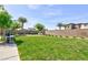 Well-maintained community park offers green spaces, benches, and mature landscaping for residents to enjoy at 4145 Lunar Canyon Ave, North Las Vegas, NV 89084