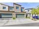 Two-story townhome with a modern design and desert landscaping for low maintenance at 4145 Lunar Canyon Ave, North Las Vegas, NV 89084