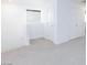Hallway with storage closet and natural light at 4145 Lunar Canyon Ave, North Las Vegas, NV 89084