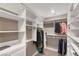 Walk-in closet with shelving, storage, and hanging racks for optimal organization at 4193 Solace St # 4193, Las Vegas, NV 89135