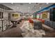 Entertainment-filled game room with shuffleboard, pool table, and bar area at 4193 Solace St # 4193, Las Vegas, NV 89135