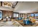 Elegant living room boasting soaring ceilings, modern decor, and abundant natural light at 4193 Solace St # 4193, Las Vegas, NV 89135