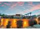 Resort-style community pool with palm trees and sunset views, offering a luxurious and relaxing outdoor experience at 4193 Solace St # 4193, Las Vegas, NV 89135