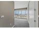 Bedroom showcases city views through large windows at 4575 Dean Martin Dr # 1208, Las Vegas, NV 89103