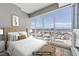 Cozy bedroom with ample natural light and stunning city vistas at 4575 Dean Martin Dr # 1208, Las Vegas, NV 89103