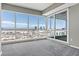 Bedroom featuring floor to ceiling windows and carpeted floor at 4575 Dean Martin Dr # 1208, Las Vegas, NV 89103