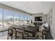 Spacious dining area with modern chandelier and panoramic city views at 4575 Dean Martin Dr # 1208, Las Vegas, NV 89103