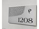Apartment number '1208' sign with a modern design at 4575 Dean Martin Dr # 1208, Las Vegas, NV 89103
