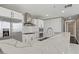 Modern kitchen featuring stainless steel appliances, white cabinets, and marble countertops at 4575 Dean Martin Dr # 1208, Las Vegas, NV 89103