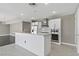 Open concept kitchen with stainless steel appliances, a kitchen island, and modern finishes at 4575 Dean Martin Dr # 1208, Las Vegas, NV 89103
