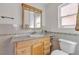 Bright bathroom with granite counters, tile backsplash, and a classic vanity at 468 Potomac St, Henderson, NV 89015