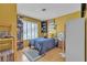 Cozy bedroom with bright walls, natural light, and laminate flooring at 468 Potomac St, Henderson, NV 89015