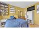 A cozy bedroom with laminate flooring, bright walls, and a queen-size bed at 468 Potomac St, Henderson, NV 89015