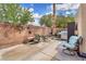 Outdoor patio features dining set and barbecue area, perfect for entertaining at 4878 Friar Tuck Ave, Las Vegas, NV 89130