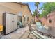 Backyard patio with outdoor seating and play area, ideal for relaxation and play at 4878 Friar Tuck Ave, Las Vegas, NV 89130
