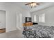Comfortable bedroom features plantation shutters, ceiling fan and neutral colors, creating a serene and inviting space at 4878 Friar Tuck Ave, Las Vegas, NV 89130