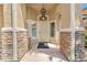 An inviting entrance with stone accents and a stylish front door welcomes you to this beautifully designed home at 4878 Friar Tuck Ave, Las Vegas, NV 89130
