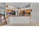 Modern kitchen features a large island, stainless steel appliances, and ample cabinet space, perfect for cooking and entertaining at 4878 Friar Tuck Ave, Las Vegas, NV 89130