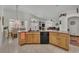 Spacious kitchen features sleek countertops, modern appliances, and ample storage, seamlessly connecting to the dining and living areas at 4878 Friar Tuck Ave, Las Vegas, NV 89130