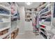 Organized walk-in closet with custom shelving, drawers, and ample space for storage solutions at 4878 Friar Tuck Ave, Las Vegas, NV 89130
