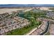 Aerial view of houses near a golf course with ponds in a Primary planned community at 5265 Lucca Ln, Pahrump, NV 89061