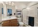 Bathroom features a vanity, toilet, and glass door shower at 5265 Lucca Ln, Pahrump, NV 89061
