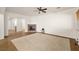 Open living room with fireplace, connecting to kitchen and dining areas at 5265 Lucca Ln, Pahrump, NV 89061