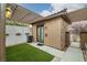 Backyard featuring a pergola covered patio, privacy fence, and stone accents at 5265 Lucca Ln, Pahrump, NV 89061