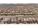 Overhead view showcasing a vast residential area with similar-style homes and neat streetscapes at 5419 Holding Ave, Las Vegas, NV 89139
