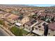 Wide aerial shot of a neighborhood with modern homes, each featuring solar panels and well-maintained yards at 5419 Holding Ave, Las Vegas, NV 89139