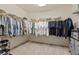 Spacious walk-in closet with ample storage space and well-organized shelving at 5419 Holding Ave, Las Vegas, NV 89139