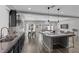 Open floorplan boasts a kitchen, dining area, and living room, perfect for gatherings at 5419 Holding Ave, Las Vegas, NV 89139