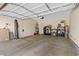 Spacious two-car garage with ample storage, a functional door, and an attached opener for modern convenience at 5419 Holding Ave, Las Vegas, NV 89139