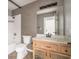 Bathroom featuring a bath and shower combination and wood vanity at 5612 Coder Ct, Las Vegas, NV 89118
