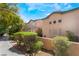 Inviting townhouse complex nestled in lush landscaping, beautiful exterior view at 5612 Coder Ct, Las Vegas, NV 89118