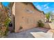 Charming home featuring stucco siding, a concrete patio, and bright windows for natural light at 5612 Coder Ct, Las Vegas, NV 89118