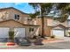Comfortable townhouse with two-car garage and low maintenance landscaping at 5612 Coder Ct, Las Vegas, NV 89118