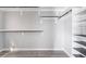 Walk-in closet with custom shelving and wood-look flooring at 5612 Coder Ct, Las Vegas, NV 89118