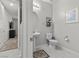 Clean and well-lit half bath with a pedestal sink and decorative wall art at 6331 Regina Ridge St, Las Vegas, NV 89149