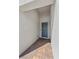 Welcoming front porch with gray door, decorative wreath, and brick flooring, perfect for guests at 6331 Regina Ridge St, Las Vegas, NV 89149