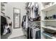 Spacious walk-in closet with organized shelving and hanging rods at 6480 Annie Oakley Dr # 814, Las Vegas, NV 89120