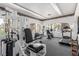 Well-equipped gym with modern machines and ample natural light streaming through large windows at 6480 Annie Oakley Dr # 814, Las Vegas, NV 89120