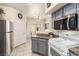 Well-lit kitchen with stainless steel appliances, granite countertops, and open floor plan at 6480 Annie Oakley Dr # 814, Las Vegas, NV 89120