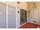 This patio features sliding doors and a durable red floor, creating a cozy and functional outdoor space at 6480 Annie Oakley Dr # 814, Las Vegas, NV 89120