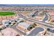 This aerial view captures the neighborhood layout with modern homes and desert landscaping at 669 Assurance Pl, Henderson, NV 89011