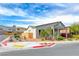 Corner lot home featuring desert landscaping and a well-maintained exterior at 669 Assurance Pl, Henderson, NV 89011