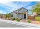 Charming single-story home with inviting front porch and landscaped front yard at 669 Assurance Pl, Henderson, NV 89011