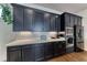 Kitchen area featuring sleek cabinetry, modern appliances, and stylish design at 669 Assurance Pl, Henderson, NV 89011