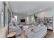 Bright living room featuring comfortable seating, a large window, and modern decor at 669 Assurance Pl, Henderson, NV 89011